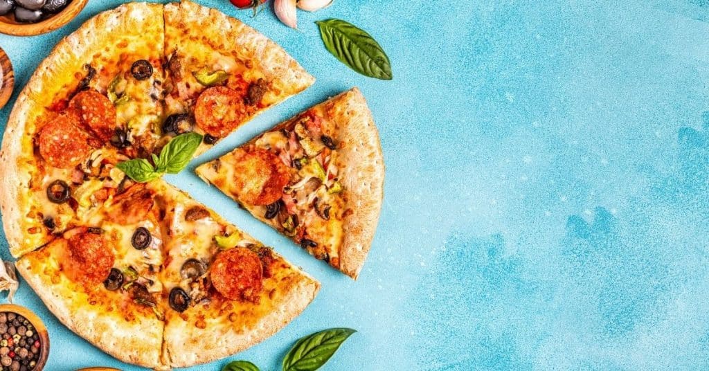 Heating pizza on a grill or barbecue