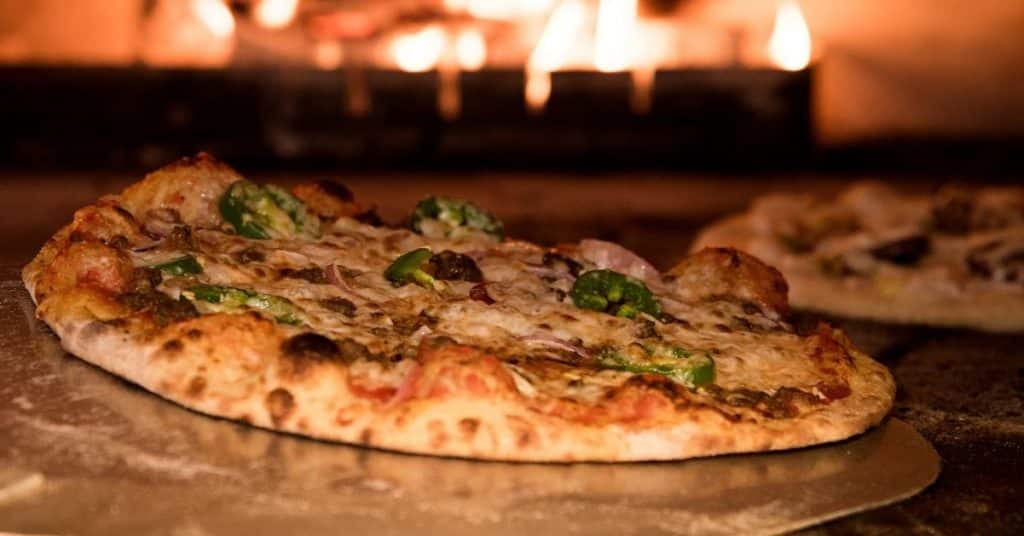 See what you need to reheat pizza and eat it.